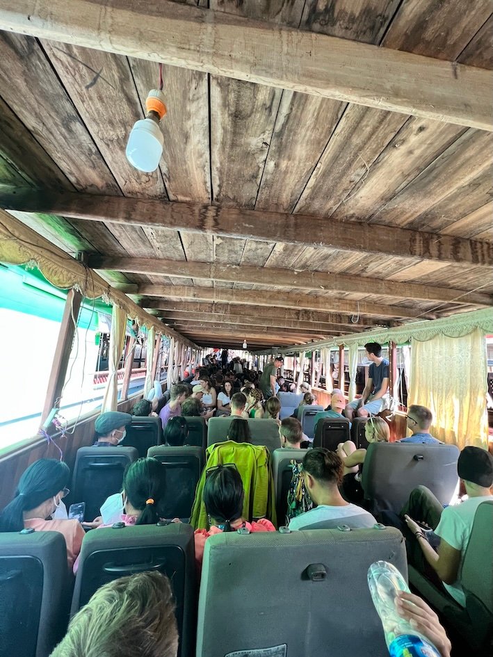 slow boat thailand laos - crowded